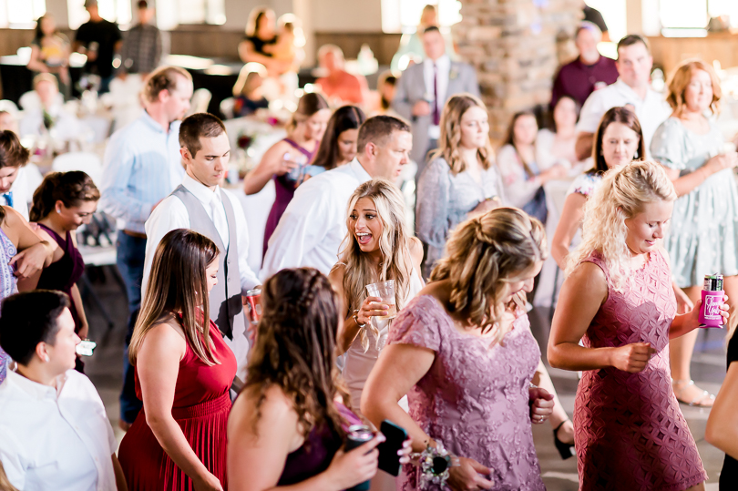 wedding guests dancing at reception