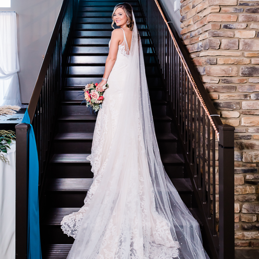 bride standing on stairwell