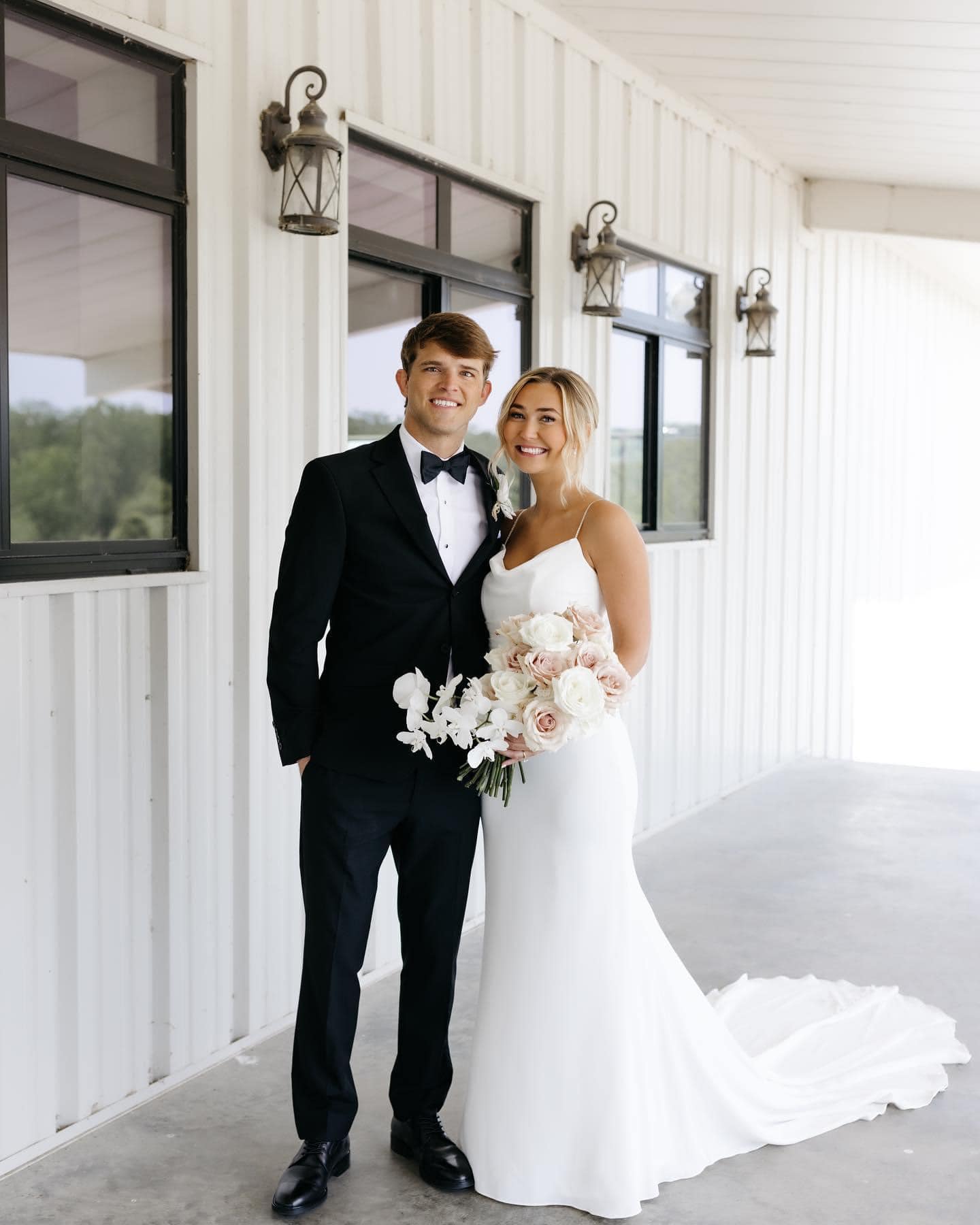 couple on wedding venue porch