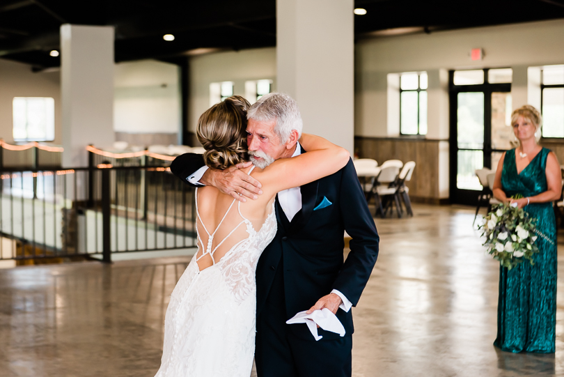 bride hugging her dad